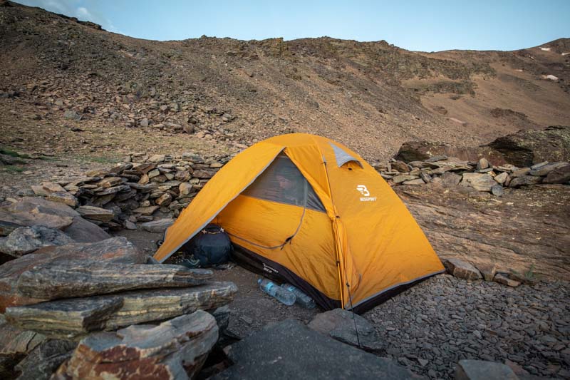 Bessport tent with open vestibule set up in mountains