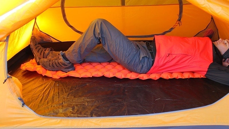 Sleeping inside the Bessport tent on a sleeping mat