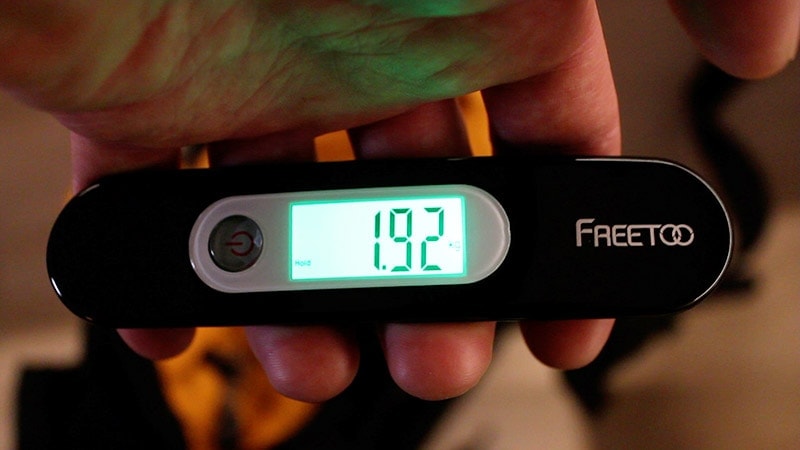 Weighing the Teton Sports Scout 3400 with a luggage scale