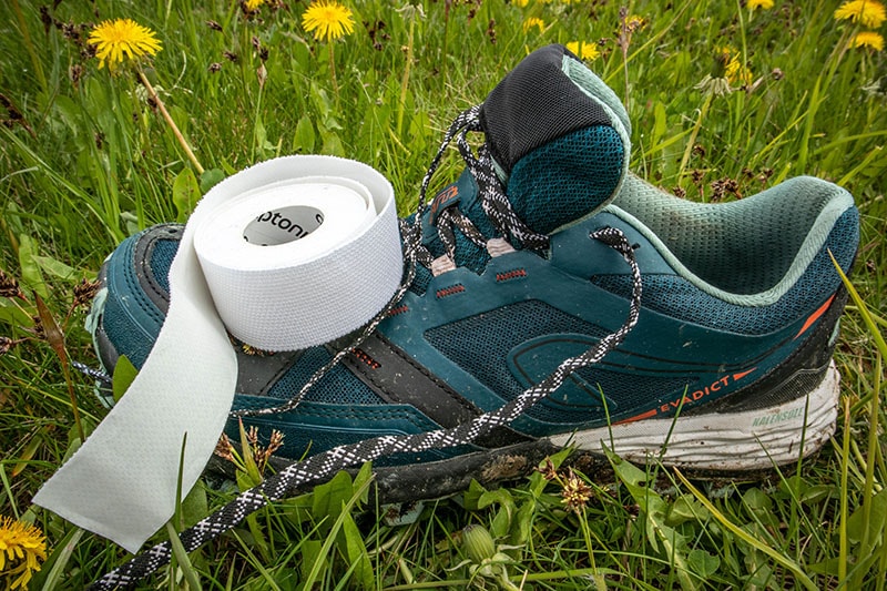 Trail runners with leuko tape on top