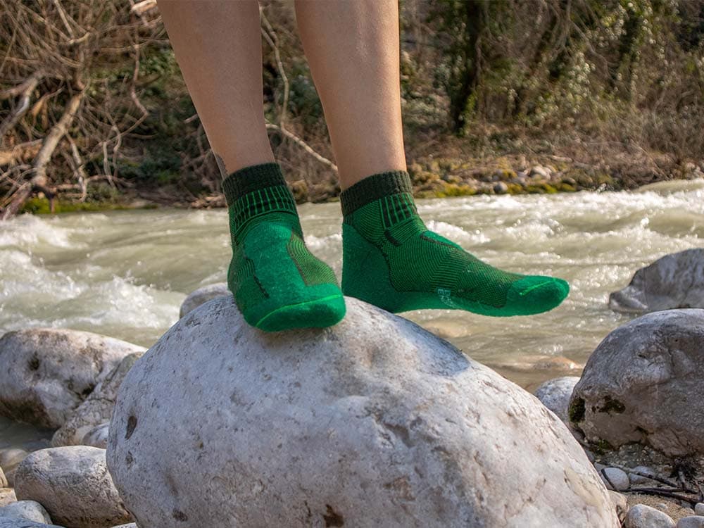 Wearing green Danish Endurance merino wool quarter hiking socks